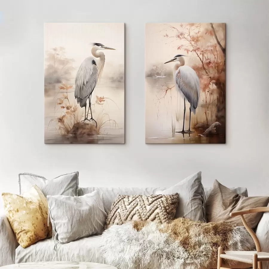 Paveikslėlis Gervė stovi ant uolos ežere, o fone matyti aukšti žolynai ir medžiai. m01239